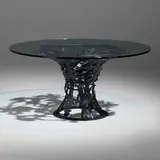 Albert Paley, Breakfast table, 2006, forged and fabricated steel with a blackened finish, glass
