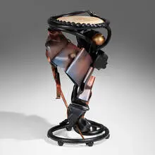 Plant stand by Albert Paley, 2009, forged, fabricated and painted steel, granite, sold Sep 2024