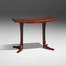 Piano Bench by Wendell Castle, 1963, Brazilian rosewood, sold Sep 2024