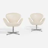 Arne Jacobsen, Swan chairs model 3320, pair, 1957, Naugahyde, cast aluminum