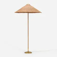 Floor lamp by Paavo Tynell, c. 1955, rattan, brass, sold Nov 2025