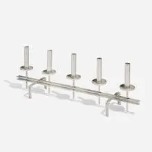 Candelabra by Paavo Tynell, c. 1965, zinc-plated steel, sold Nov 2025
