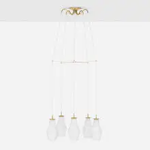 Chandelier by Paavo Tynell, c. 1955, brass, opal glass, sold Nov 2025