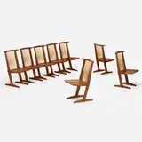 Conoid chairs, set of eight by George Nakashima, 1972-75, 1982, American black walnut, hickory, sold May 2024