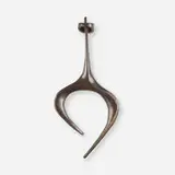 Rare door knocker by Paul Evans, c. 1965, patinated bronze, sold May 2024