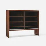 Special shelving unit by George Nakashima, 1974, American black walnut, glass, aluminum, sold May 2024