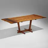 Conoid dining table by George Nakashima, 1963, American black walnut, rosewood, sold May 2024