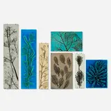 Toini Muona, Collection of seven botanical wall plaques, c. 1960, glazed stoneware