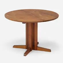 Round Cluster-Based dining table by George Nakashima, 1974, American black walnut, rosewood, sold May 2024