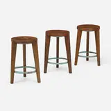 Stools from Punjab University, Chandigarh, set of three by Pierre Jeanneret, c. 1965, teak, enameled steel, sold May 2024