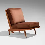 Cushion chair by George Nakashima, 1956, American black walnut, upholstery, sold May 2024
