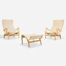 Pernilla 69 lounge chairs, pair and ottoman by Bruno Mathsson, laminated and steam-bent beech, canvas webbing, sold Nov 2025