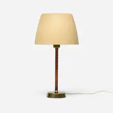 Ihanne table lamp by Lisa Johansson-Pape, c. 1958, enameled aluminum, leather, brass, sold Nov 2025