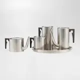 Arne Jacobsen, Cylinda four-piece coffee and tea service with tray, 1967, stainless steel, Bakelite