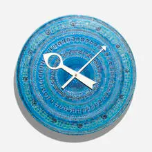 Rimini Blu wall clock, model 7552 by Howard Miller Clock Co. and Bitossi, c. 1970, glazed stoneware, enameled aluminum, sold Feb 2024