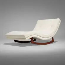Adrian Pearsall, Rocking lounge chair, c. 1960, bouclé upholstery, walnut