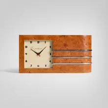 Gilbert Rohde, World's Fair table clock, model 4082, c. 1933, Maidou burl, chrome-plated steel, enameled aluminum, glass