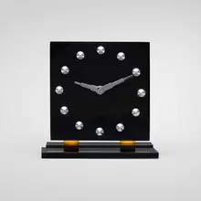 Table clock by Art Déco, c. 1935, Bakelite, chrome-plated brass, sold Nov 2025