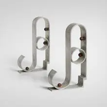 Andirons, pair by Art Déco, c. 1940, aluminum, painted steel, sold Nov 2025