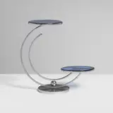 Art Déco, Two-tier display stand, c. 1935, chrome-plated steel, silvered blue glass, glass