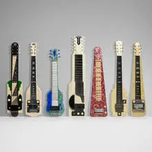 Art Déco, Collection of seven lap steel guitars, c. 1955, pearloid, acrylic, chrome-plated steel, lacquered wood
