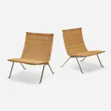 PK 22 lounge chairs, pair by Poul Kjaerholm, rattan, matte chrome-plated steel, sold Jan 2024