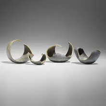 Paul Evans, Collection of four rare ashtrays, c. 1960, cast lead, 24k gold leaf