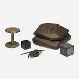 Collection of four tabletop accessories by Paul Evans, c. 1965, bronze, slate, steel, velvet, sold Jan 2024