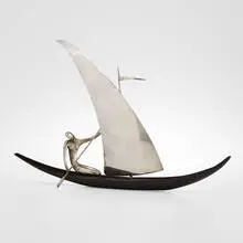 Sailboat by Hagenauer, c. 1935, nickel-plated brass, carved and lacquered wood, sold Jan 2024