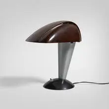 Polaroid desk lamp, model 114 by Walter Dorwin Teague, 1939, Bakelite, aluminum, enameled aluminum, sold Nov 2025