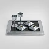 Norman Bel Geddes, Collection of Manhattan tabletop articles, 1937, chrome-plated brass, glass