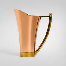 Tavern pitcher, model 17026 by Walter von Nessen, c. 1935, copper, brass, sold Nov 2025
