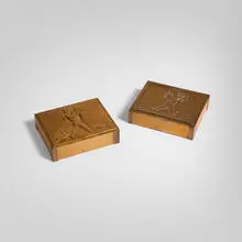 Bacchus cigarette boxes, pair by Rockwell Kent, 1935-36, wood, copper, sold Nov 2025