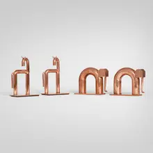 Chase Brass & Copper Co., Collection of bookends, two pairs, c. 1930, copper-plated brass