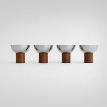 Cocktail cups, set of four by Art Déco, c. 1930, stainless steel, walnut, sold Nov 2025