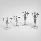 Chase Brass & Copper Co., Athena candelabra, two pairs, c. 1940, chrome-plated metal, glass