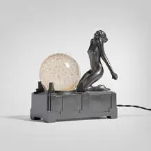 Inc. Frankart, Figural table lamp, c. 1930, cast and enameled aluminum, glass
