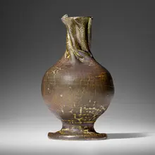 Vase by George E. Ohr, 1898-1910, glazed earthenware, sold Jan 2024