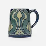 Early mug with plant cross-sections by Gertrude Roberts Smith for Newcomb College Pottery, c. 1905, glazed earthenware, sold Jan 2024