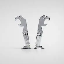 Negbaur, Polly Parrot corkscrew/bottle openers, pair, c. 1935, chrome-plated metal