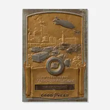 Goodyear advertising plaque by Medallic Art Co., c. 1935, enameled steel, copper, sold Nov 2025