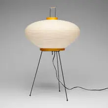 Akari light sculpture, model 9AD by Isamu Noguchi, 1952 / 2015, washi paper, bamboo, enameled steel, cane, rubber, sold Nov 2025