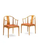 : A pair of 'China' chairs, model FH 4283, designed 1966, manufactured by Fritz Hansen, 1980's by Hans J. Wegner, solid cherry, buttoned leather, offered Apr 2018