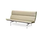 Charles Eames, and Ray Eames (American, 1912-1988) : compact sofa, designed 1940's, manufactured by Herman Miller from 1954, enamelled steel, chrome, vinyl upholstery, with fold-down back