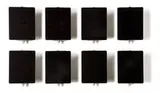 Wall lights (8) by Charlotte Perriand, c. 1965, Enameled metal, sold Oct 2012