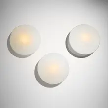 Arne Jacobsen, AJ Eklipta wall lamps for Rødovre Town Hall, set of three, 1959, painted aluminum, milk glass