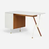 Desk by attribution Greta Magnusson Grossman, c. 1952, walnut, laminate, enameled steel, sold Nov 2025