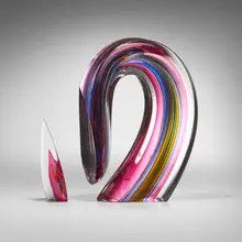 Ruby Sliced Descending Form by Harvey Littleton, 1985, cased, hot-worked, cut, and polished glass, sold Nov 2023