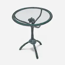 Occasional table by Diego Giacometti, patinated iron, glass, sold Nov 2025