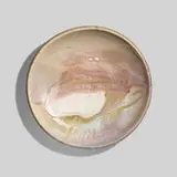 Plate by Toshiko Takaezu, c. 1985, glazed stoneware, sold Sep 2023